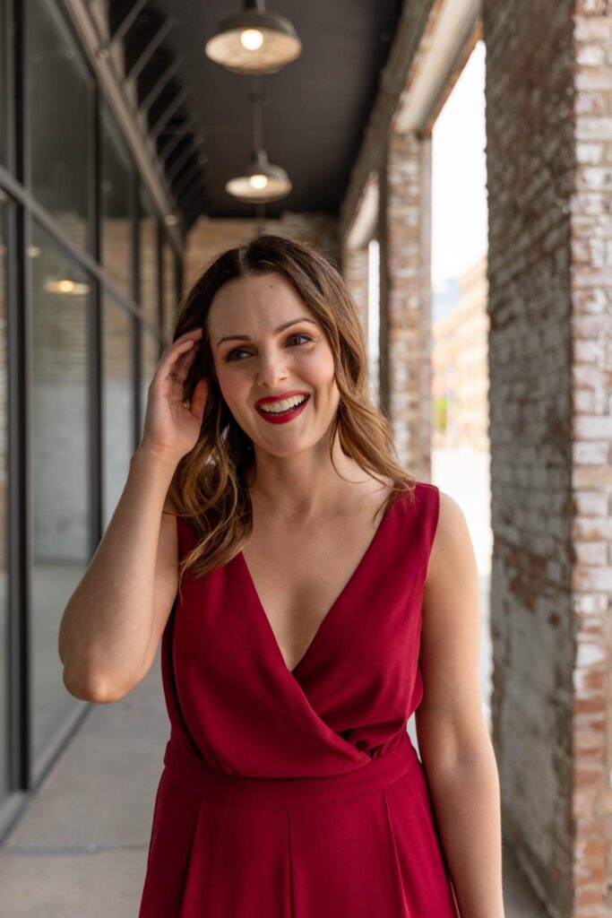 Kara Francis in red dress